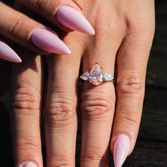 4.13 Ct Fancy Pink Lab Grown Pear Cut Diamond Three Stone Engagement Ring - Helodia Jewelry