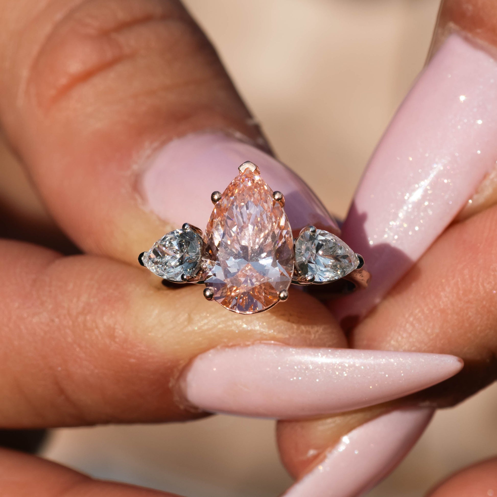 4.13 Ct Fancy Pink Lab Grown Pear Cut Diamond Three Stone Engagement Ring - Helodia Jewelry